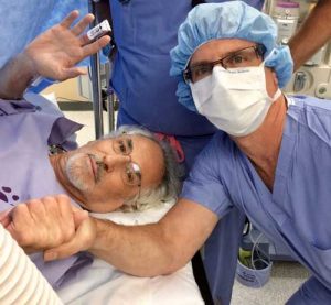 Dr. Yunis with Patient after surgery