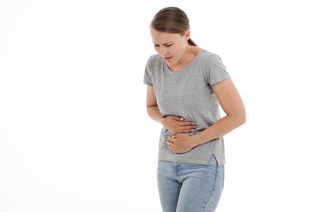 woman with pain in stomach